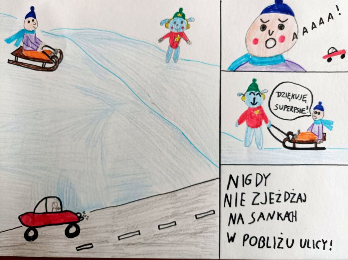 Zdjęcie przedstawiające komiks na którym widnieje chłopiec i Sznupek. Chłopiec zjeżdża z górki w pobliżu jezdni.