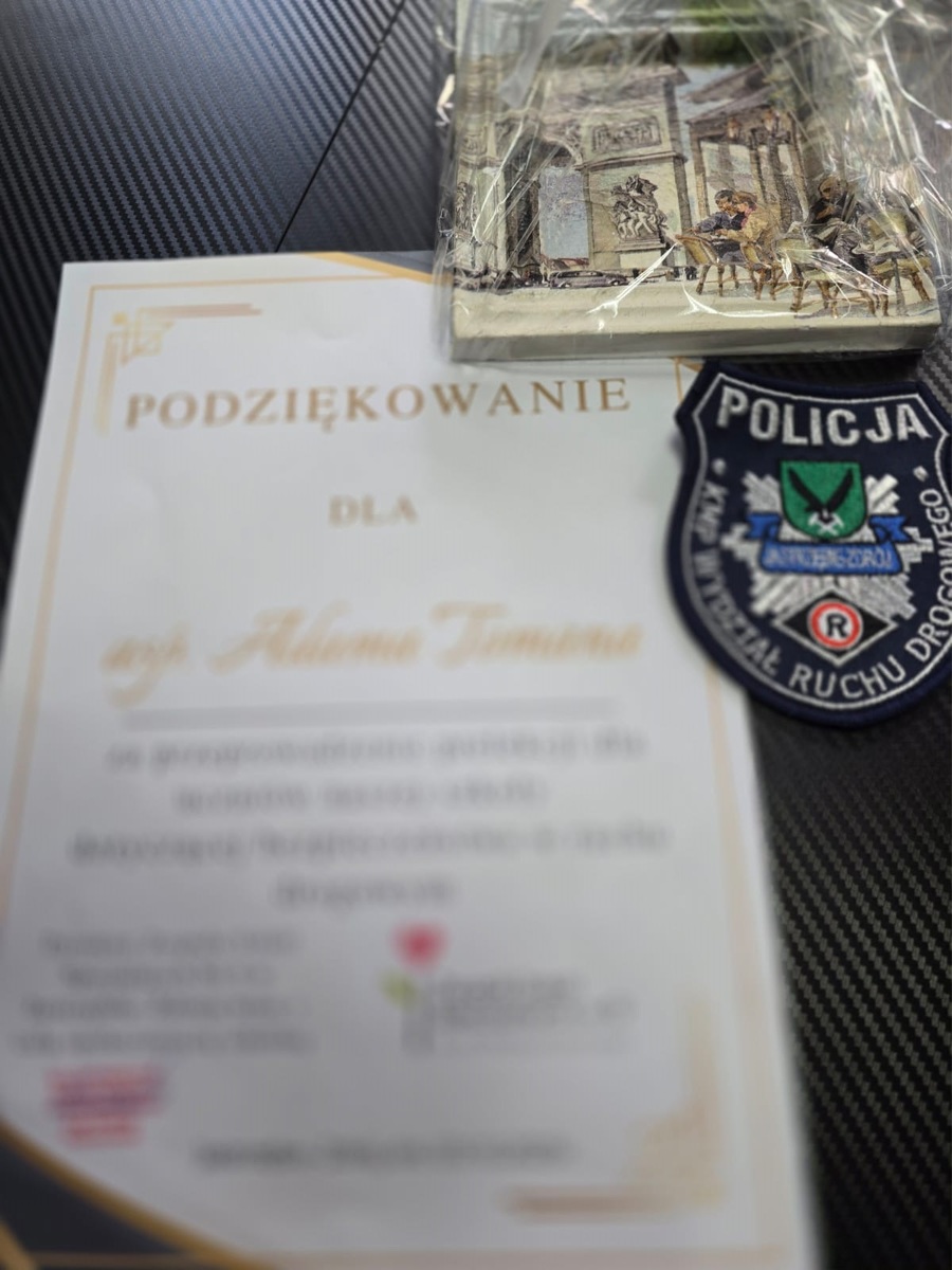 Zdjęcie pisemnego pdoziękowania oraz ręcznie wykonanej pracy.