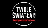 Plakat przedstawiający napis &quot;Twoje Światło- Nasze Bezpieczeństwo&quot;