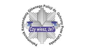 Zdjęcie przedstawiające odznakę policyjną.