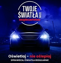 Zdjęcie przedstawiające plakat na którym widoczny jest samochód z włączonymi światłami.