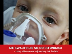 Zdjęcie przedstawiające chłopca z założoną maską tlenową.