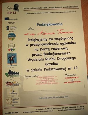 Zdjęcie przedstawiające dyplom.