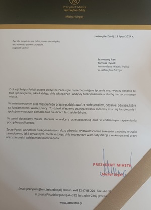 Zdjęcie przedstawiające treść listu gratulacyjnego.