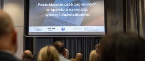 Zdjęcie osób zebranych na konferencji.