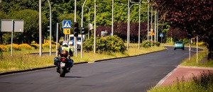 Zdjęcie Policjanta na motocyklu.