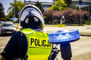 Zdjęcie Policjanta na motocyklu.