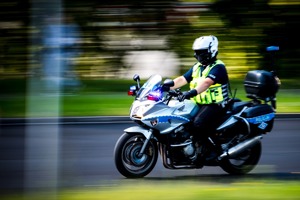 Zdjęcie Policjanta na motocyklu.