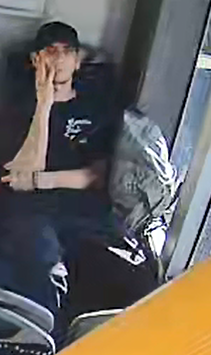 Zdjęcie mężczyzny z czapką z daszkiem.