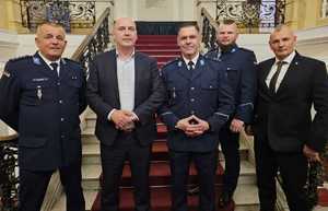 Zdjęcie przedstawiające osoby uczestniczące w konferencji.