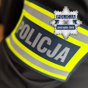 Opaska na rękę z napisem Policja.