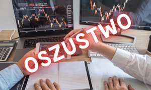 Zdjęcie rąk dwóch osób przy komputerze.